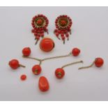 Pair of yellow metal coral bead target earrings with clip fastenings, together with a further single