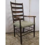 A pair of Arts & Crafts style ladderback open armchairs with green dralon upholstered seats raised