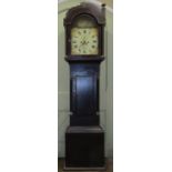 A Regency mahogany longcase clock with arched outline and spiral column supports enclosing a painted