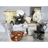 Kitchenalia consisting of an enamel bread bin, a table top mince press, pestles and mortars,