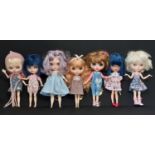 A mixed group of seven 21st century customised Blythe type dolls; all have colour changing eyes