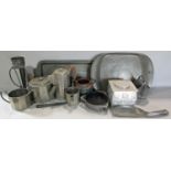 A collection of arts and crafts and art nouveau table ware items, mainly in pewter comprising four