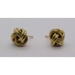 Pair of 18ct knot stud earrings, 3.2g (no butterflies)