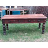 A substantial Victorian oak table, the rectangular top with moulded outline and rounded corners over