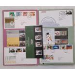 Three albums containing a quantity of First Day Cover and Royal Mail mint stamp collections (3)