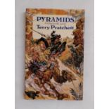 Pratchett, Terry - Pyramids, first edition 1989 and signed by the author (1) (displayed in cabinet
