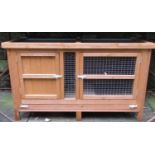 A contemporary soft wood rabbit hutch 122 cm wide x 65 cm deep x 73 cm high