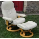 An Ekorness Stressless soft cream stitched leather upholstered adjustable lounge chair and