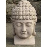 A painted plaster buddha's head, 38 cm high