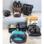 A box of eight pairs of assorted binoculars.