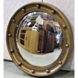 Two vintage Regency style convex wall mirrors with reeded slips and ball surrounds, one with later