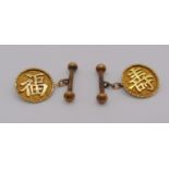 Pair of 18ct Chinese character cufflinks, 6.5g