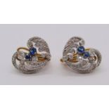 Pair of Belle Époque sapphire and diamond clip earrings in white and yellow metal, 9.9g total