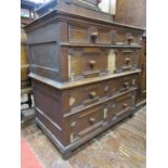 An 18th century countrymade two sectional oak chest enclosing an arrangement of four drawers of