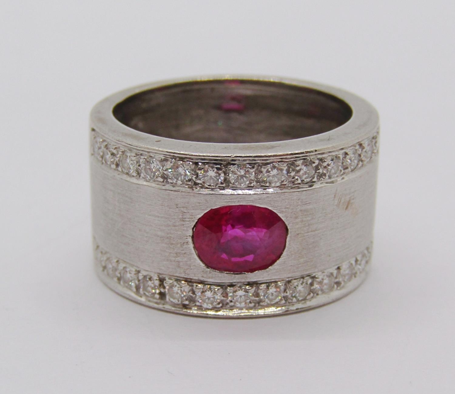 18ct white gold band ring set with an oval ruby and two rows of diamonds, size K/L, 8.9g - Bild 4 aus 4