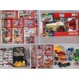 Large collection of model agricultural vehicles by Britains including tractors, combine
