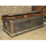 An antique stained pine carpenters tool chest and contents to include various moulding planes,