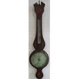 A Georgian mahogany wheel barometer with silvered dials and shell inlaid detail, maker N. Ortelli