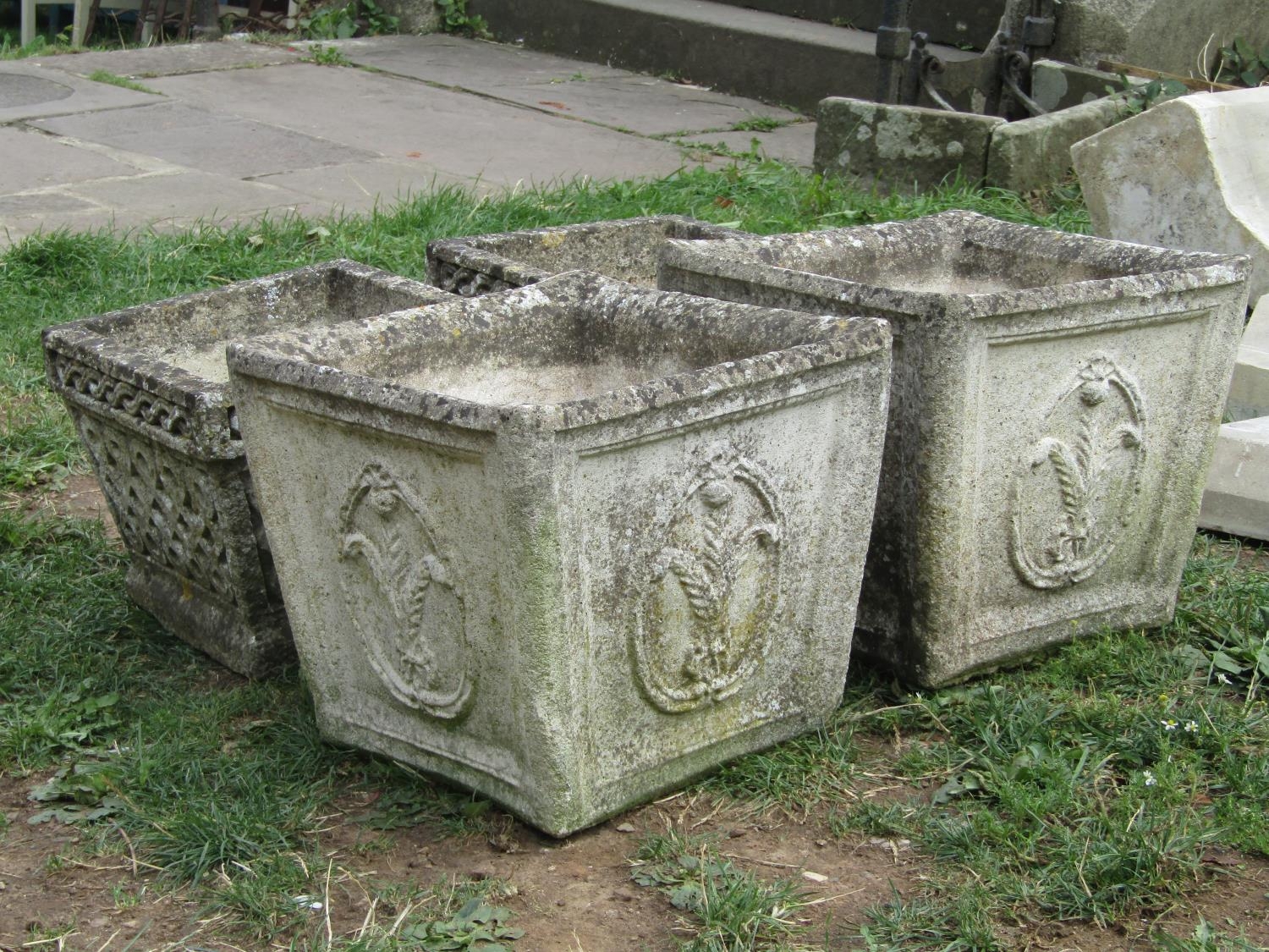 A pair of weathered cast composition stone planters of square tapered form with repeating fleur-de- - Bild 2 aus 2