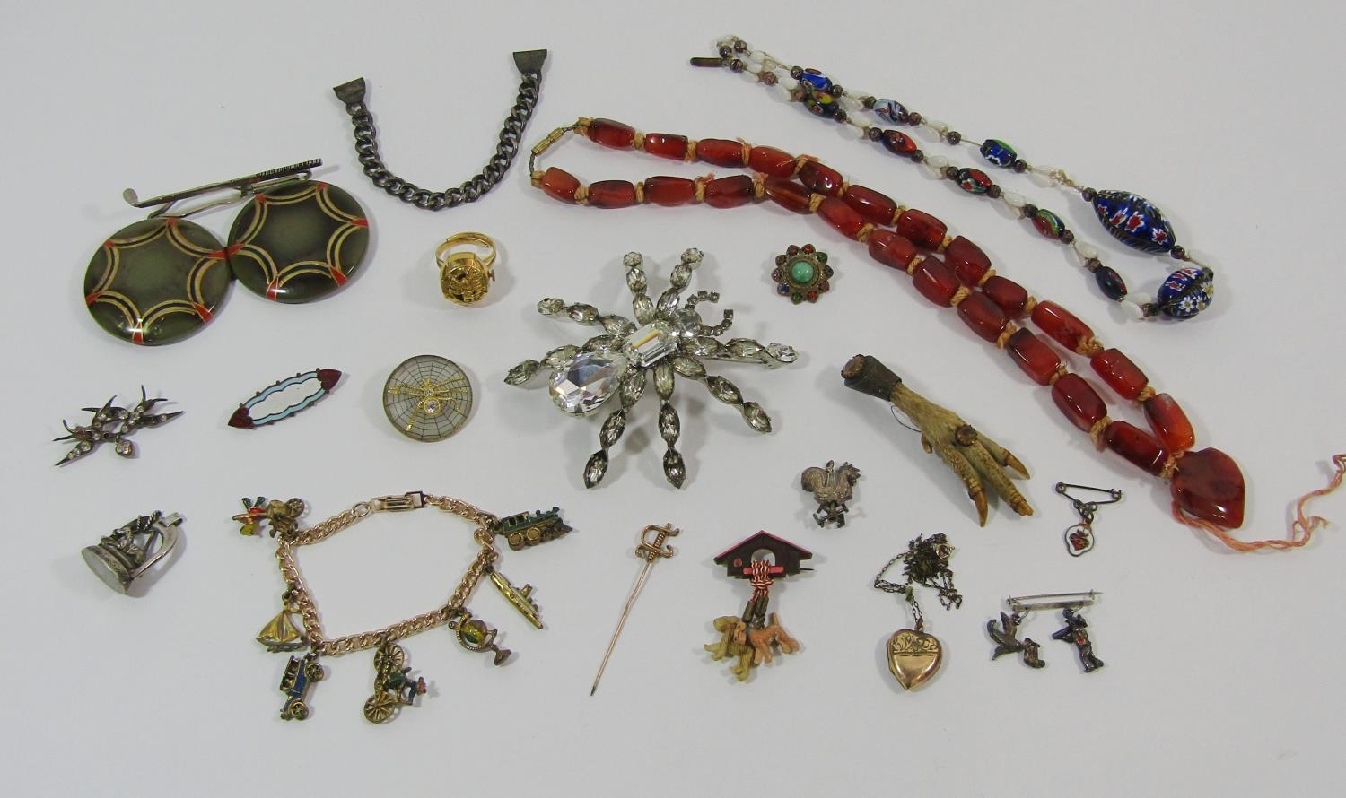 Collection of antique and vintage costume jewellery to include a white metal equestrian sport fob (