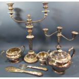 A selection of silver plated items including a two branch Georgian style candelabra with