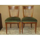 A set of six 19th century stick back chairs in elm with brass inlay, upholstered seats on swept