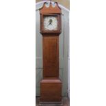 A Georgian oak cottage longcase clock enclosing a square painted dial, to the spandrels stooks of