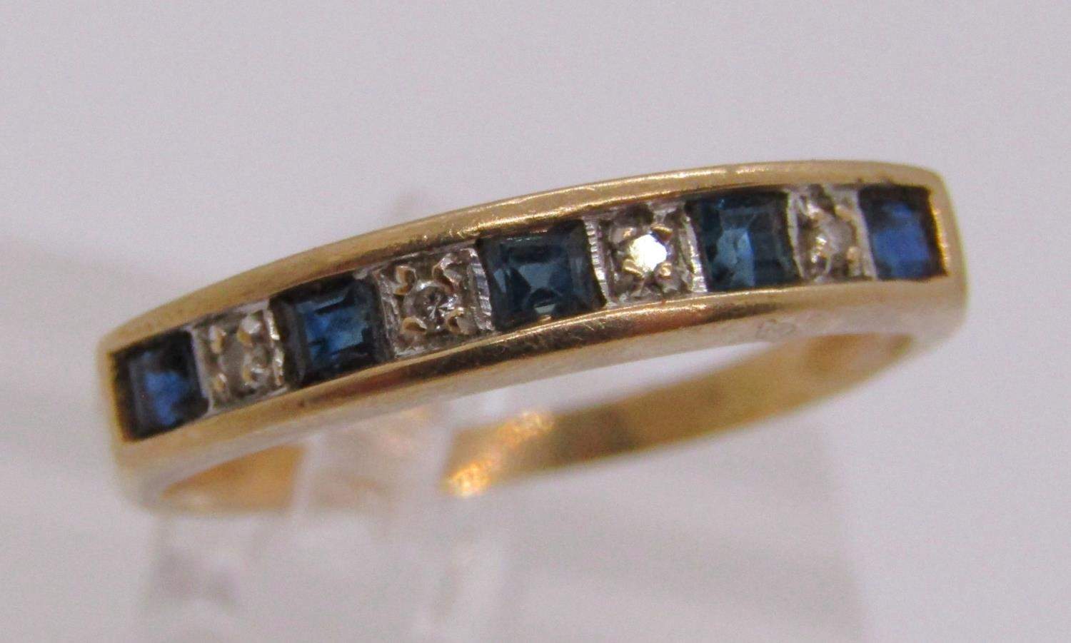 9ct sapphire and diamond half hoop ring, size O, 1.9g