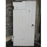 Five reclaimed antique painted legged and braced internal pine doors, some complete with fittings,