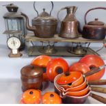 Kitchenalia: A set of four Le Creuset orange saucepans (as found), copper kettles, a brass plate