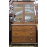 A Victorian oak countrymade dresser, the upper recessed section enclosed by a pair of rectangular