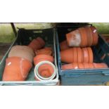 Approximately 50 plus terracotta flower pots and planters of varying design and size, (some af)