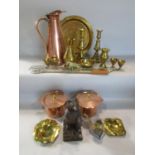 A Black Forrest type bear 18cm tall, a copper jug, and a quantity of brass and copper ware , tray,