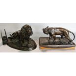 Bronze lion and lioness, possibly part of a desk set by Otto Kainz. 22cm approx ( repair to