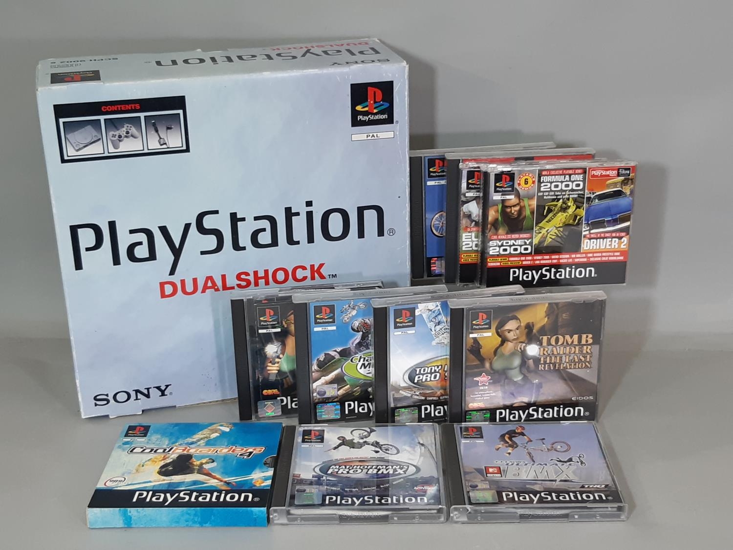 Sony PlayStation Dual Shock (SCPH-9002B) boxed with cables, consoles, instructions and a range of