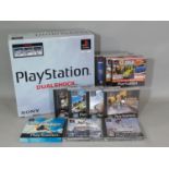 Sony PlayStation Dual Shock (SCPH-9002B) boxed with cables, consoles, instructions and a range of