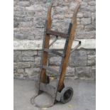 A vintage heavy gauge sack truck, with ashwood shafts, hard rubber wheels