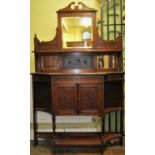 A Victorian mahogany chiffonier, the base enclosed by a central cupboard flanked by open shelves,