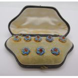 Cased set of antique yellow metal garnet dress jewellery with blue enamel detail, comprising five