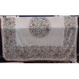 Large crewelwork bedspread with chain stitched borders around a central motif 235 x255cm. Some stain