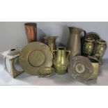 A collection of arts and crafts and art nouveau items comprising graduated ewers, small lantern,
