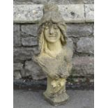 A weathered buff coloured head and shoulder bust of an art nouveau style maiden, 65cm high
