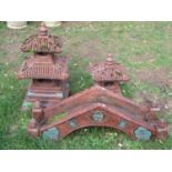 Three contemporary cast composition stone garden ornaments in the form of a Chinese style bridge, 92