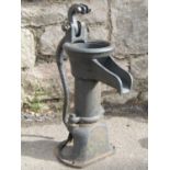 A cast iron hand lever operated water pump, 50cm high
