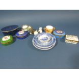 A collection of miniature ceramics to include four lidded pill boxes, cup and saucer, two handled