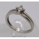 14ct white gold diamond solitaire crossover ring, 0.20cts approx, size L, 2.2g