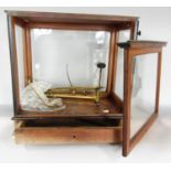 A mahogany cased chemist scale (as found) a rosewood writing slope, (as found).