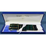 Waterman Laureat green marbled fountain pen with 18k nib together with a matching ball point pen and