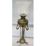 An early 20th century Art Nouveau brass Hinks Safety oil lamp with a flared glass shade. 74cm high.