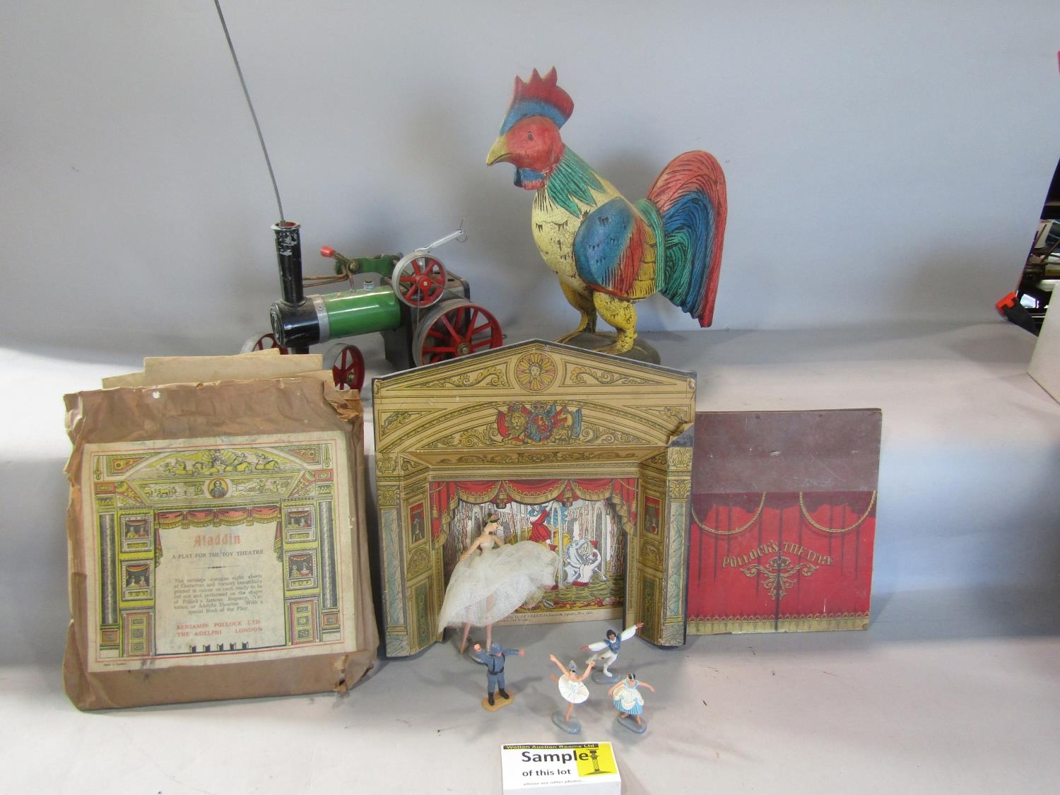 A 1960’s Mamod Steam Tractor, a disassembled Benjamin Pollock Children’s Theatre, with assembling